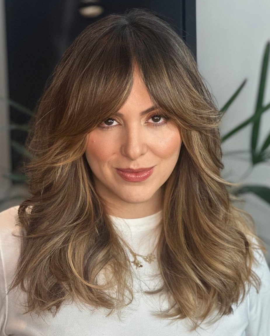 Mid-length hair with curtain bangs