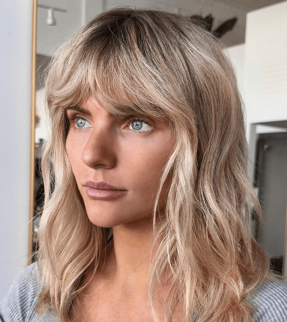 Mid-length haircut with layered bangs